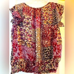 Multi colored ladies top. Beautiful  sheer wrinkle free. No cami needed.